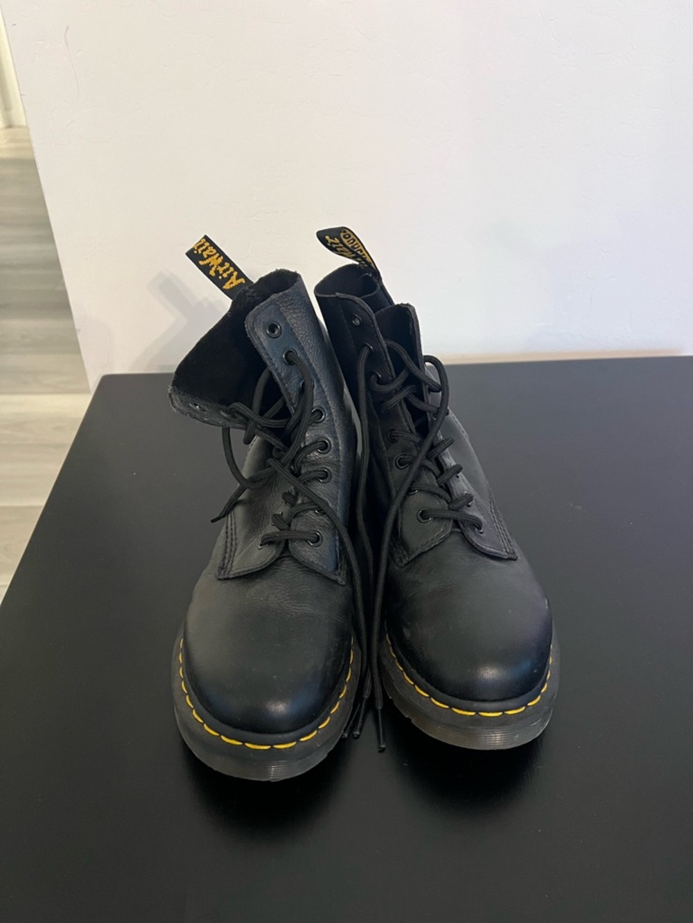 Dr. Martens Black Leather 8-Eye Lace-Up Boots with Yellow Stitching